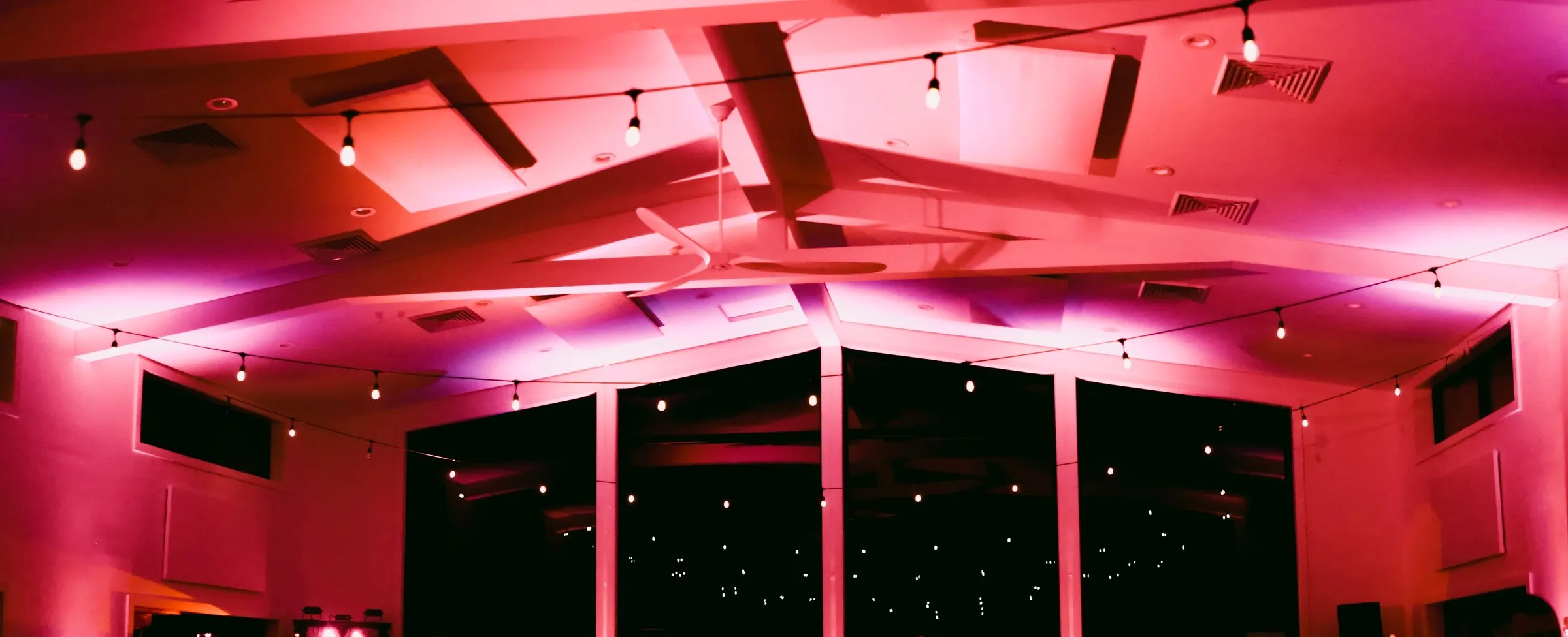 Reception room washed in uplighting
